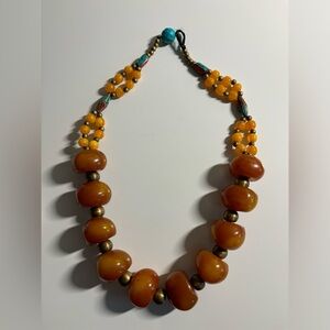Gorgeous natural copal with metal and stone accents necklace. 22”